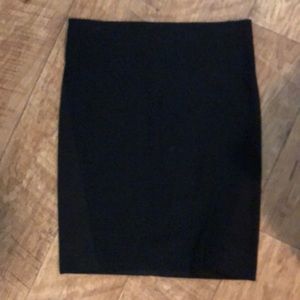 Black BCBG pencil skirt. Knee length